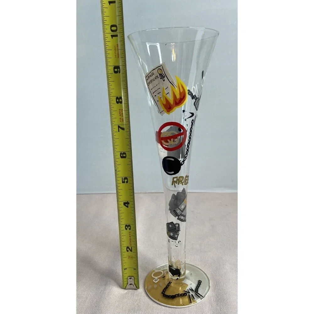 LOLITA - DIVORCE CHAMPAGNE FLUTE  GLASS HAND PAINTED. SOME PAINT WEAR ON GLASS.